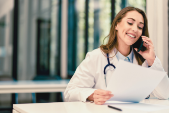A healthcare provider examines communications served by predictive intelligence that delivers the right message at the right time.