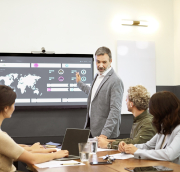 Biopharma team reviewing global launch plans with a map highlighting the U.S., Europe, Japan and China.