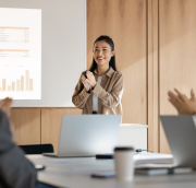 Business meeting with happy colleagues